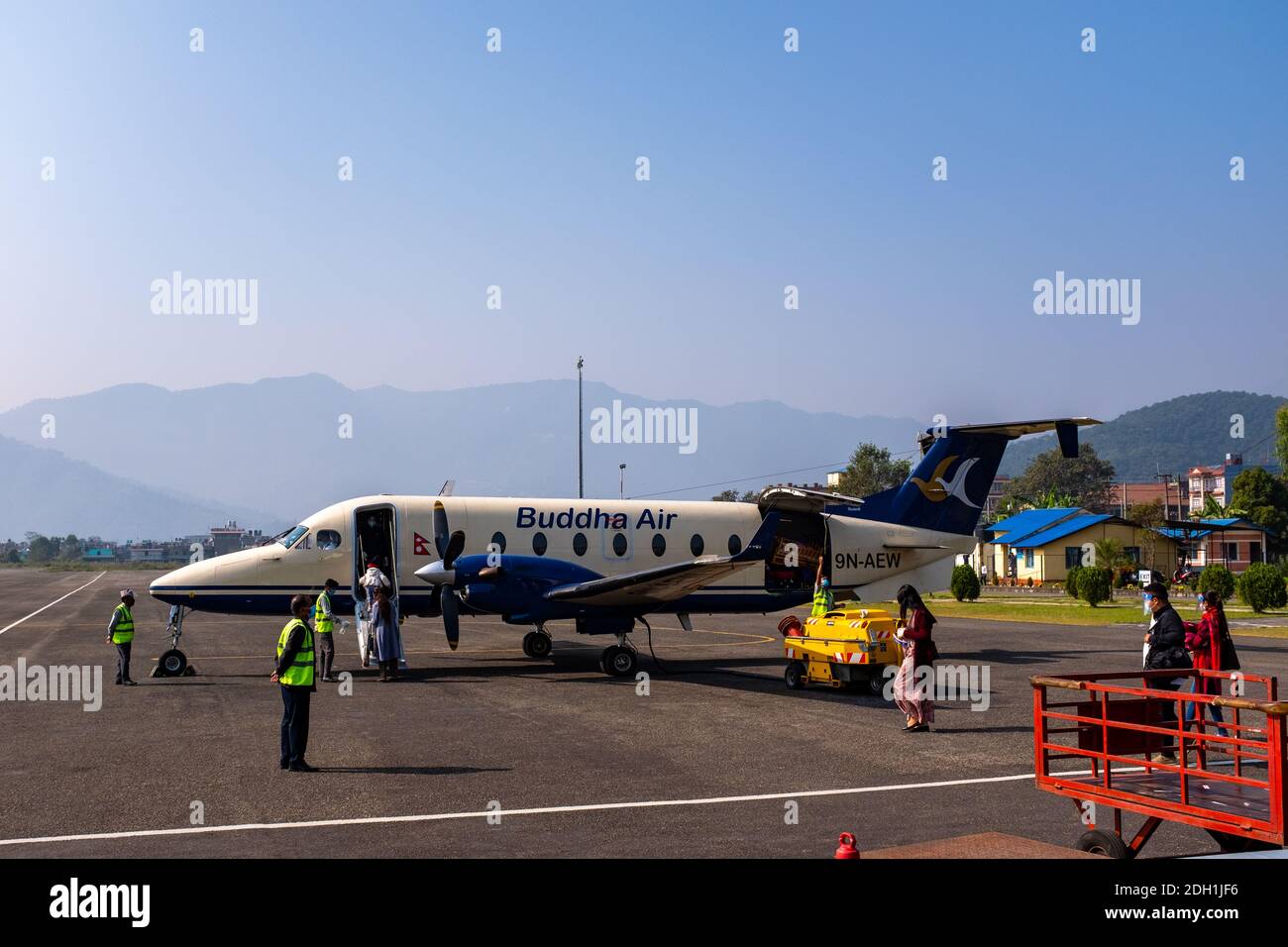 A Buddha Air Beechcraft 1900D aircraft at Pokhara domestic airport in Nepal Stock Photo