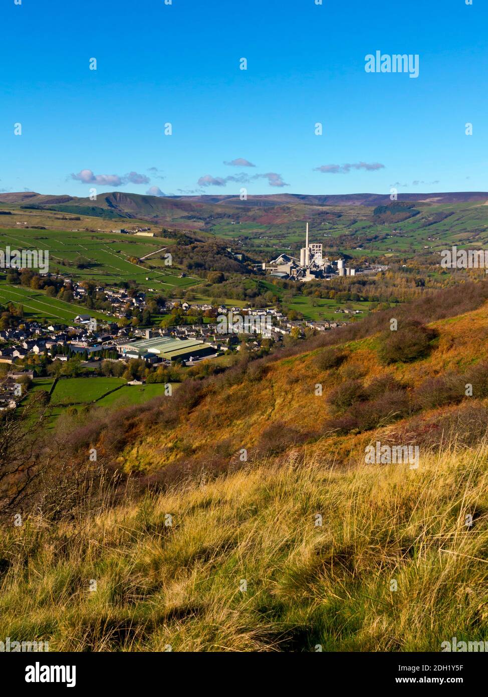 Hope Cement Works and Bradwell village viewed from Bradwell Edge in the Peak District National Park Derbyshire England UK with Mam Tor in the distance Stock Photo