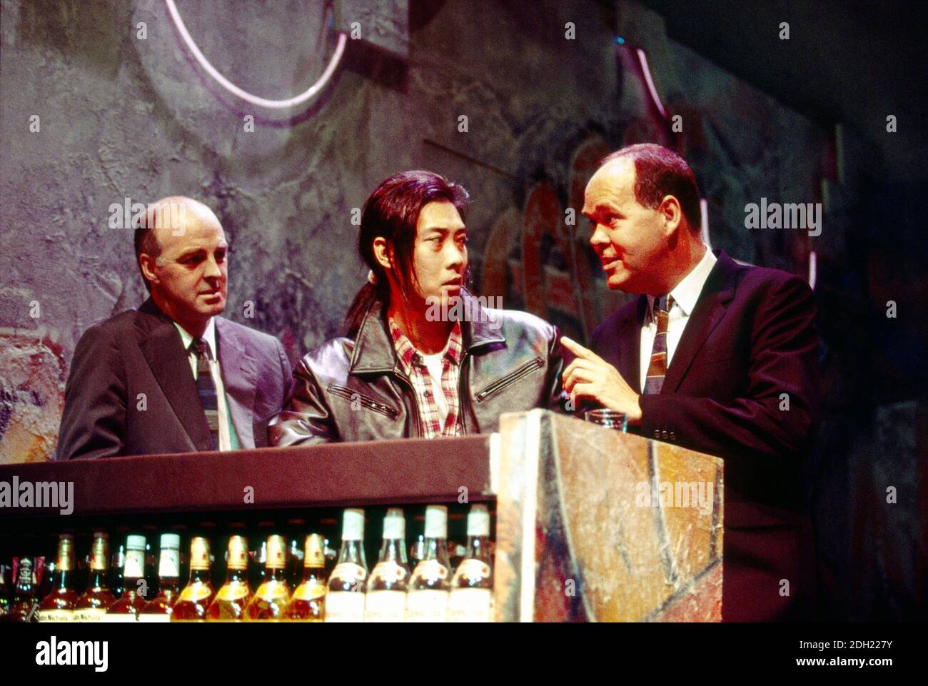 l-r: Tony Guilfoyle (Costello), Francois Chau (Greg), Richard Cordery (Buddy) in THE L. A. PLAYS by Han Ong at the Almeida Theatre, London N1  09/11/1993  design: Julian McGowan  lighting: Rick Fisher  director: Matthew Lloyd Stock Photo