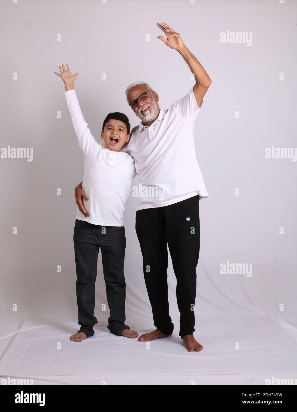 Happy Indian grandfather and grandson spending quality time Stock Photo