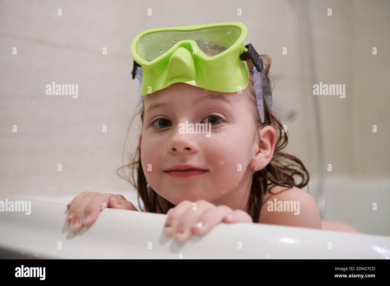 Little girl with snorkel goggles Stock Photo Alamy