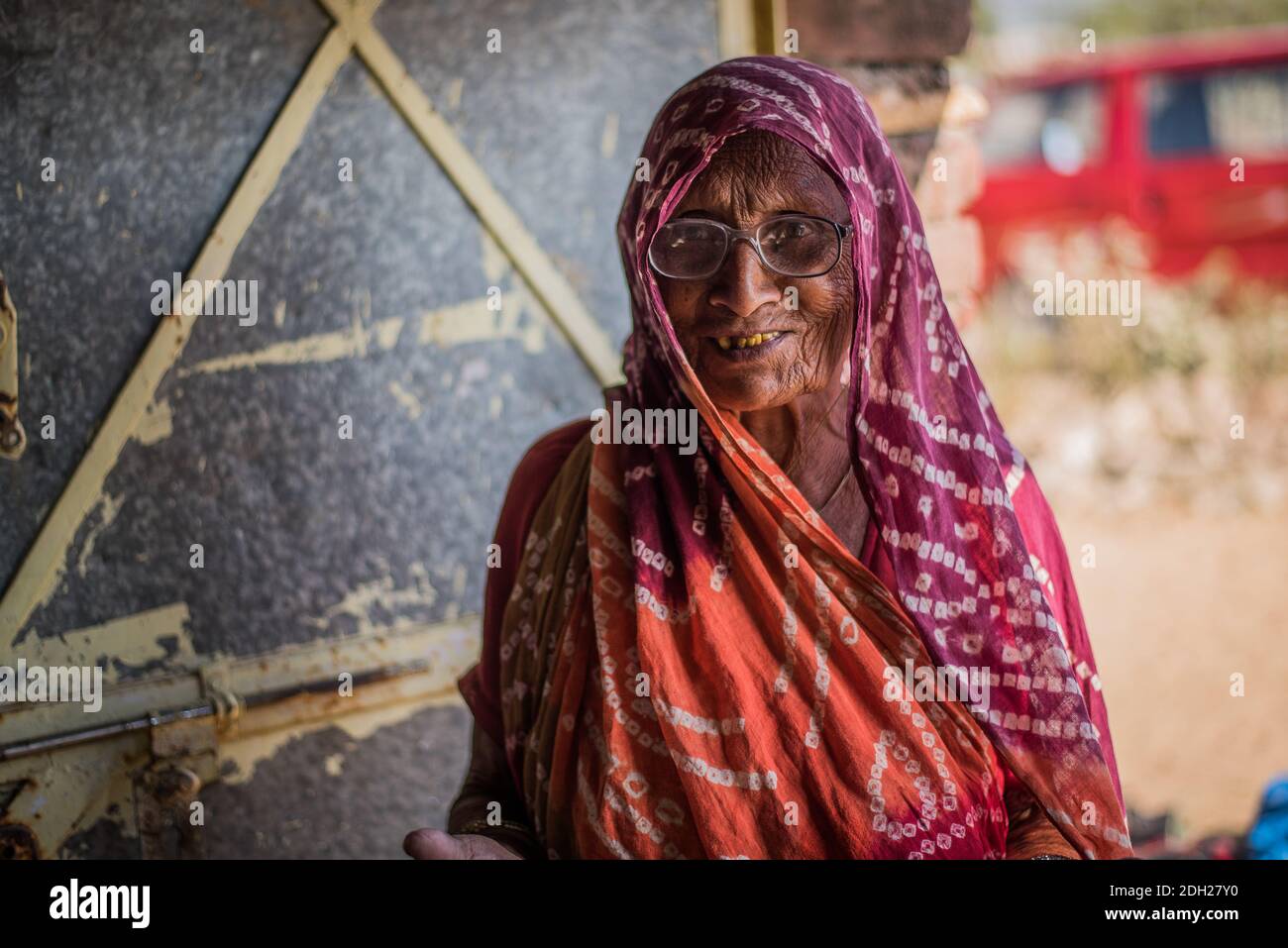 Old woman in India receiving treatment from a doctor who work for a Non government organization. Stock Photo
