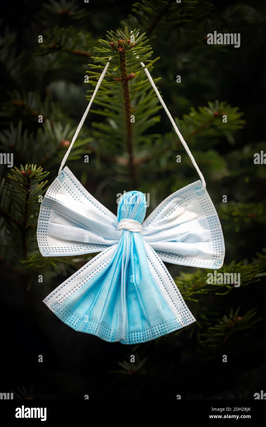 A Christmas Angel decoration made from recycled medical masks. This shows  the uniqueness of 2020 and is a tribute to thank all the medical Angels who  Stock Photo - Alamy