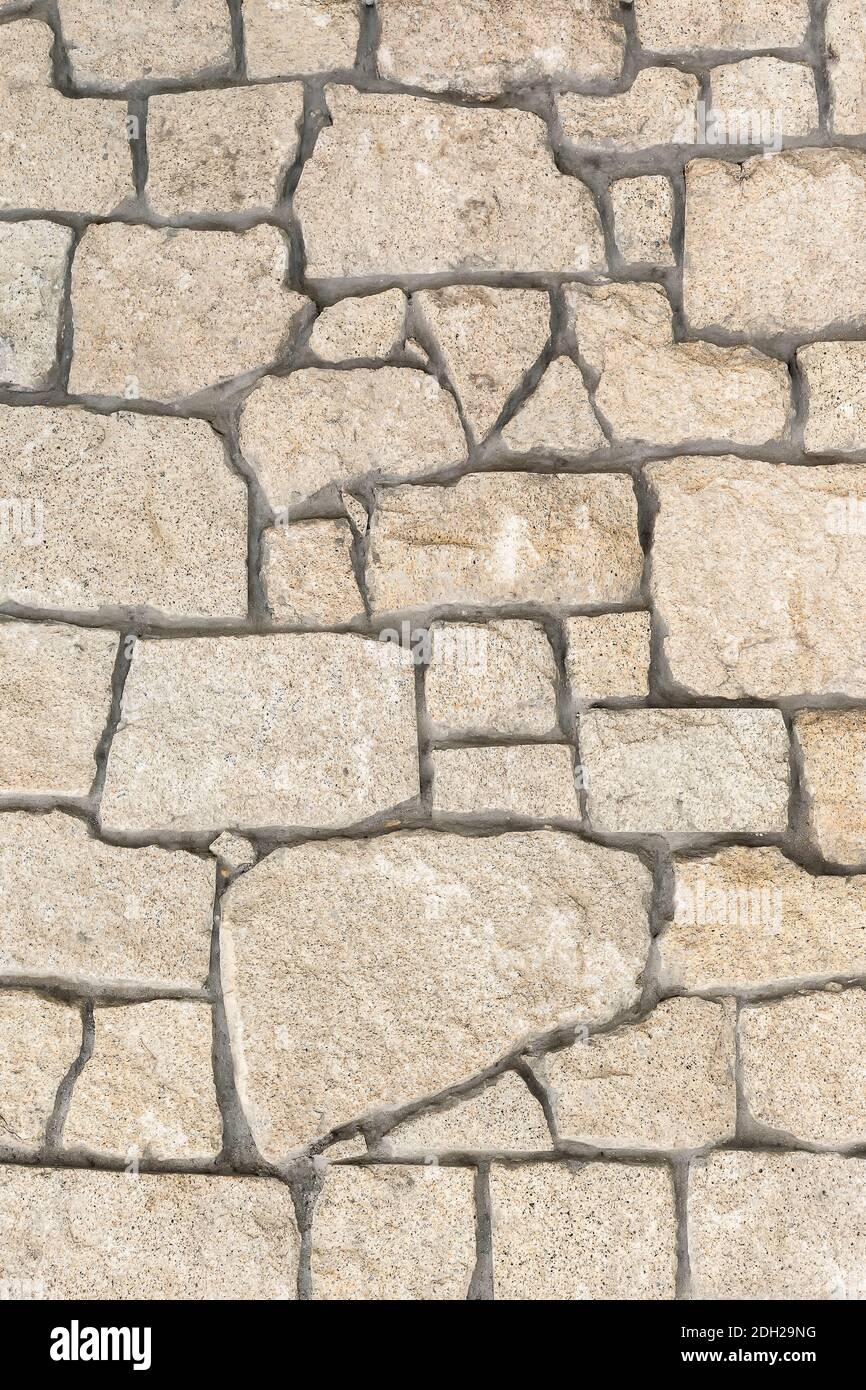 Rustic stone wall background. Abstract pattern backdrop. Stock Photo
