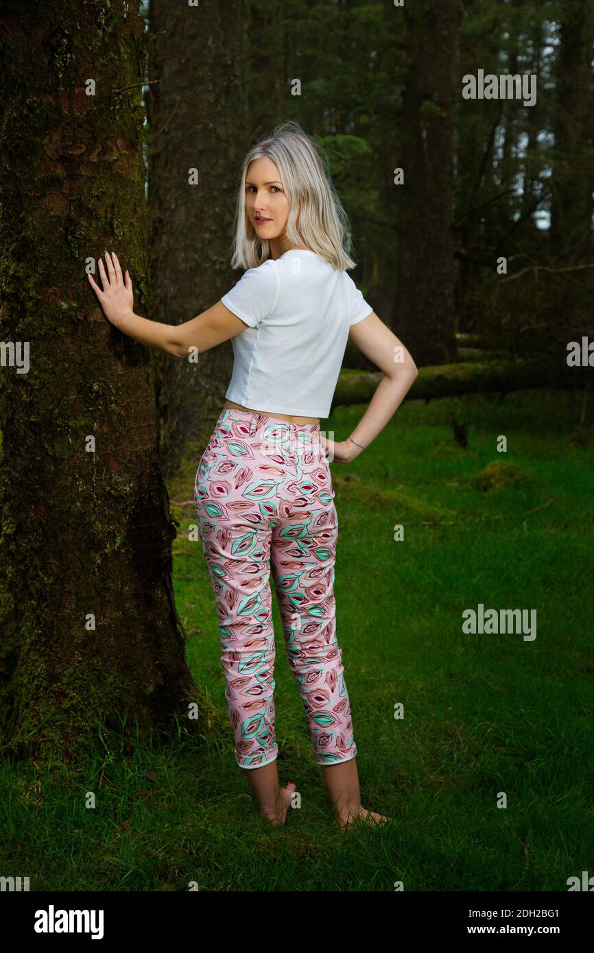 A young model with silver hair out in the countryside Stock Photo