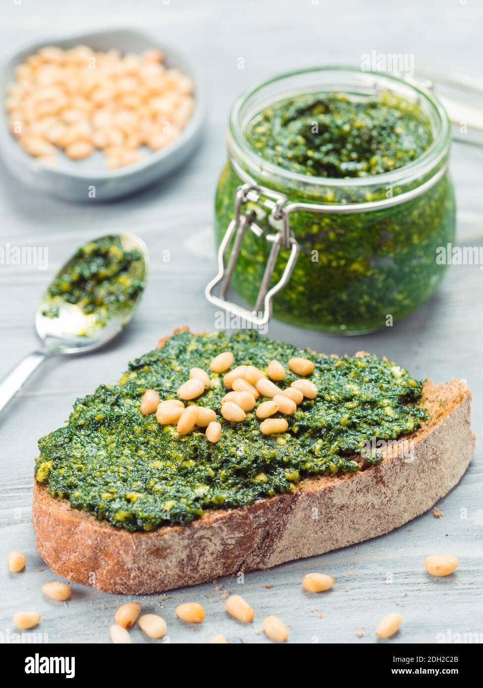 Whole grain rye bread with fresh pesto Stock Photo Alamy