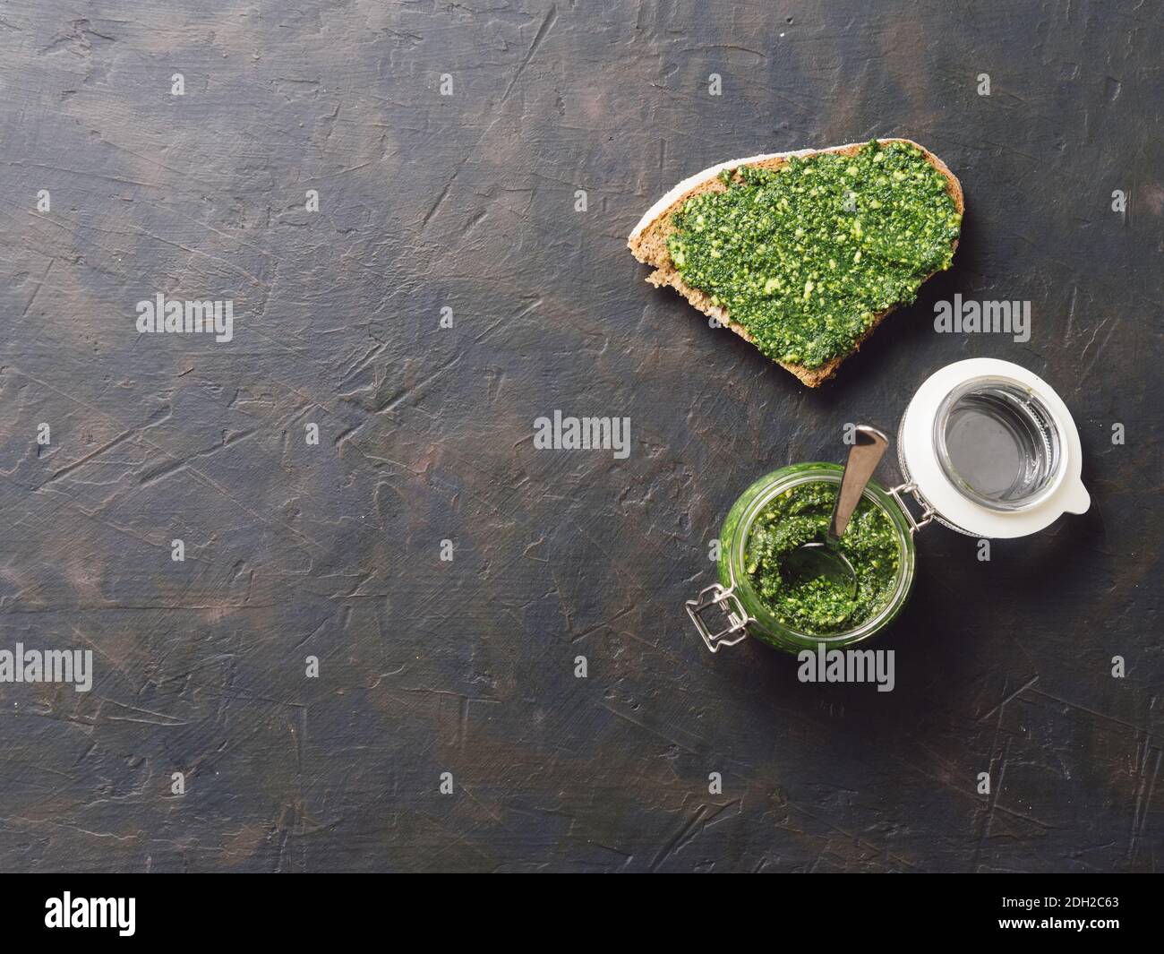 Whole grain rye bread with fresh pesto Stock Photo Alamy