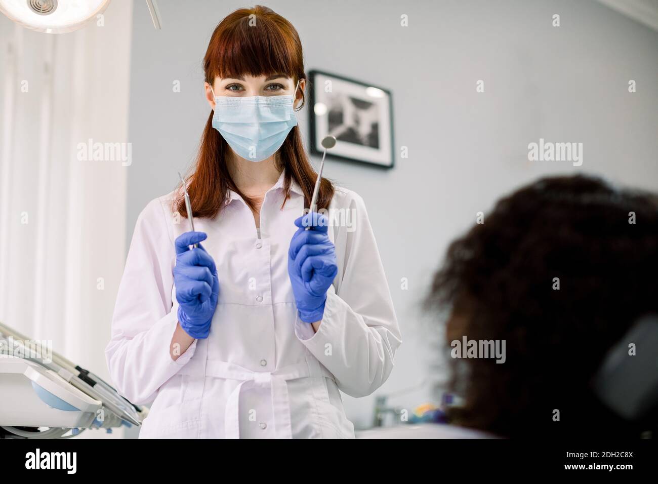 Dentisry concept, oral and teeth care. Young attractive female dentist