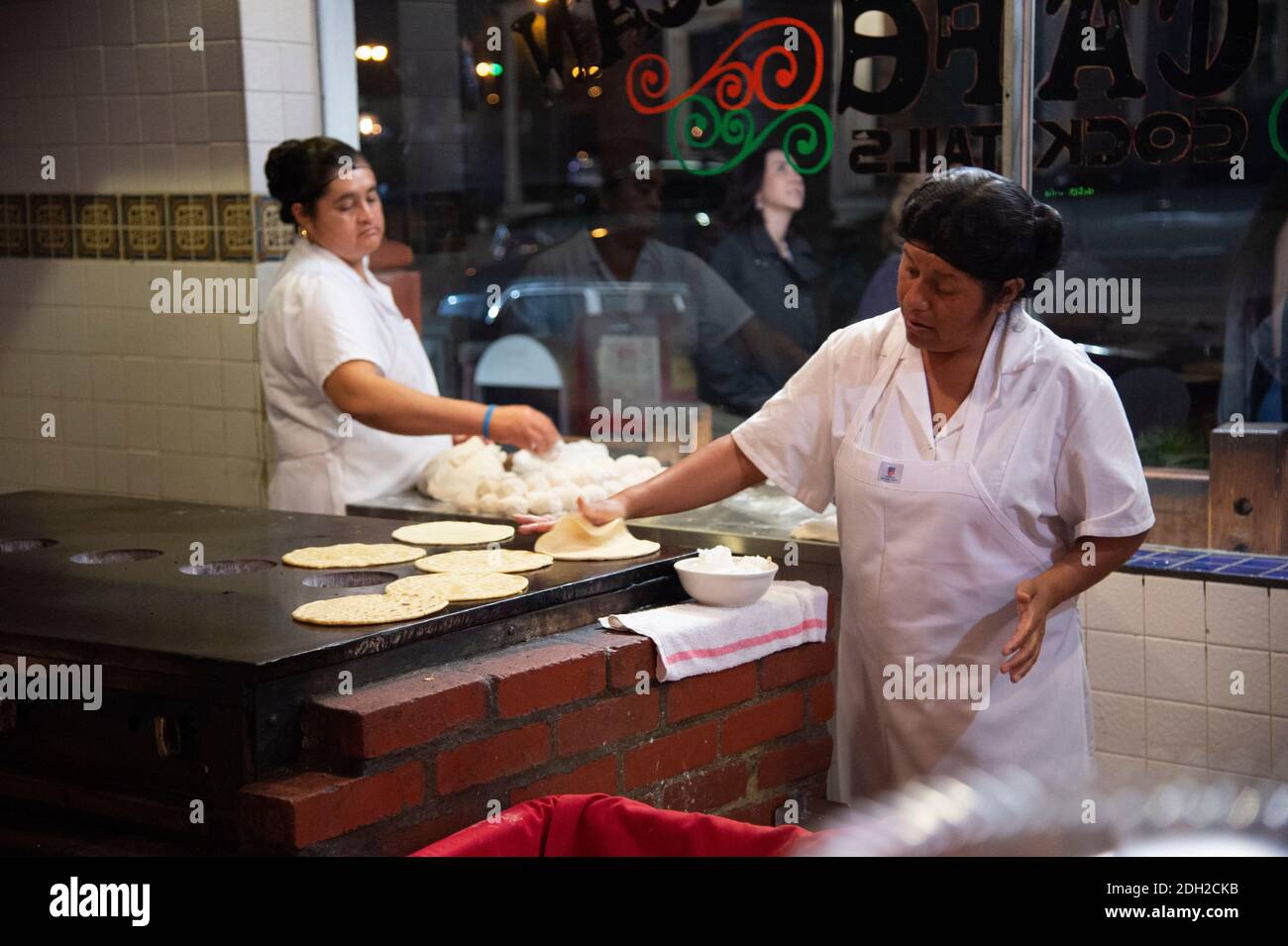 Women make hand made tortillas at the Old Town Mexican Cafe, Old Town