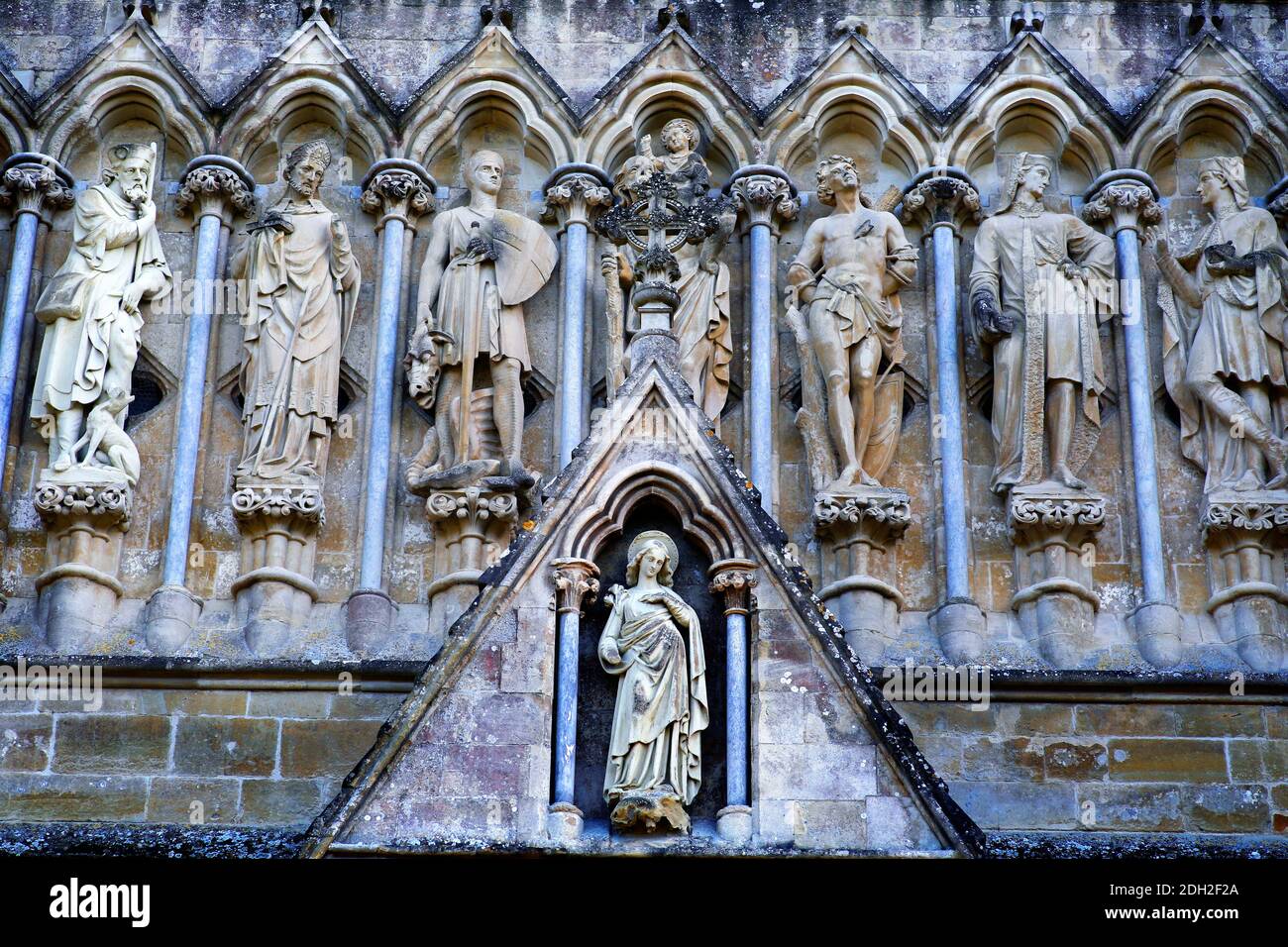 Architectural detail and sculptures above the main door of Salisbury Cathedral, Wiltshire. Stock Photo