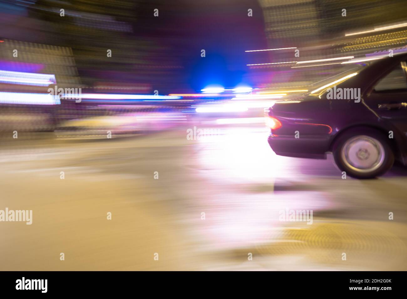 A car and flashing lights at night Stock Photo - Alamy