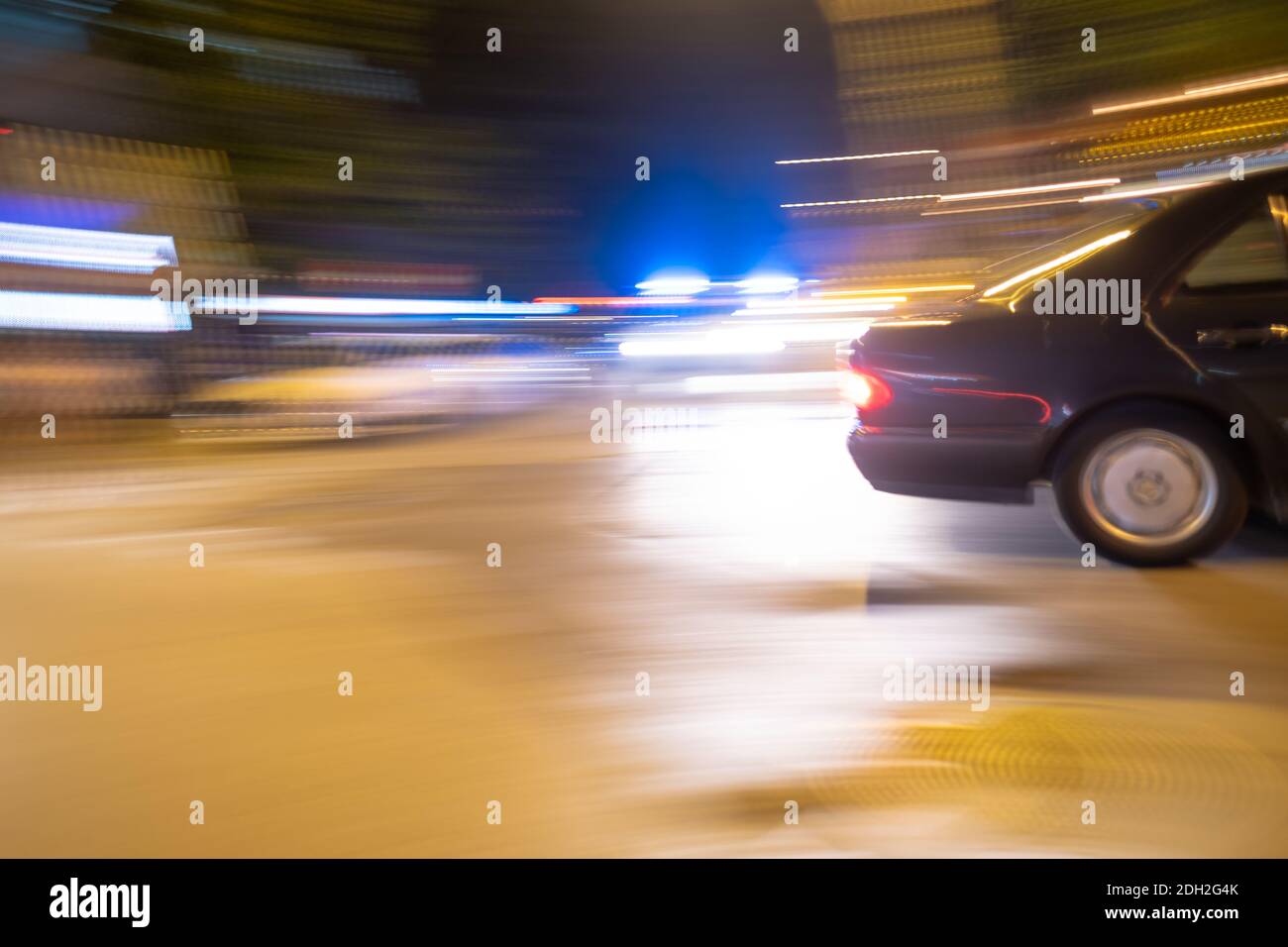 A car and flashing lights at night Stock Photo - Alamy