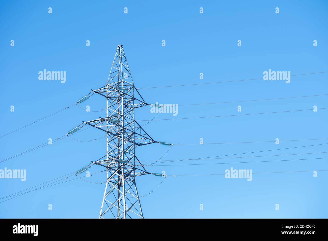 Power line towers against of the blue sky Stock Photo - Alamy