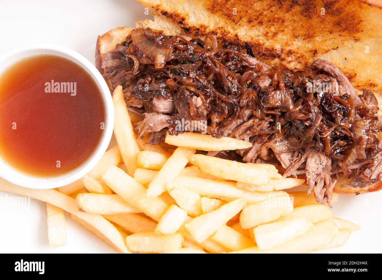 classic french dip au jus or beef dip with fries and sauteed onions