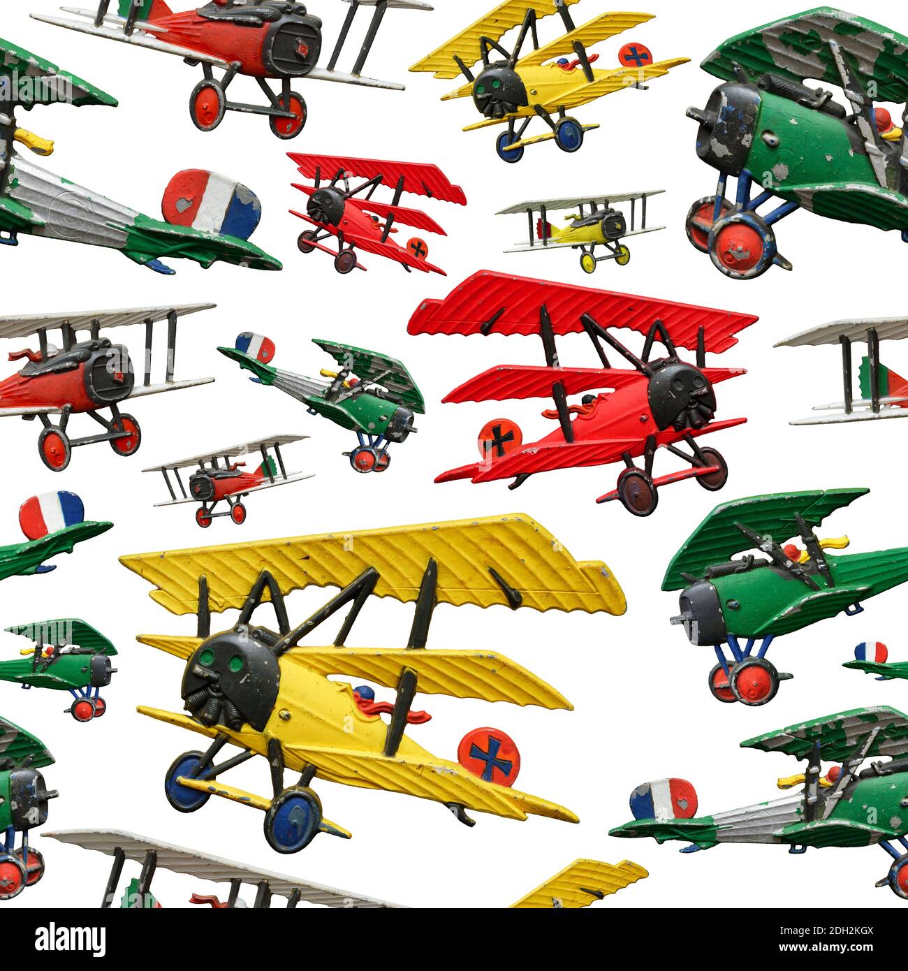 Assorted set of generic vintage First World War toy airplanes, various colors, isolated on white background, seamless pattern Stock Photo