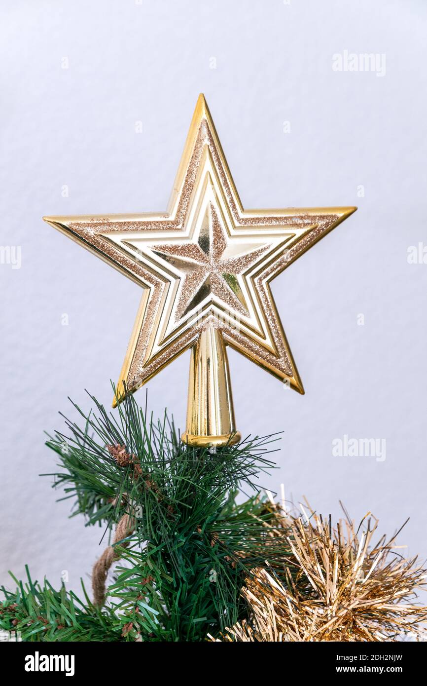 Golden star christmas tree decoration Stock Photo