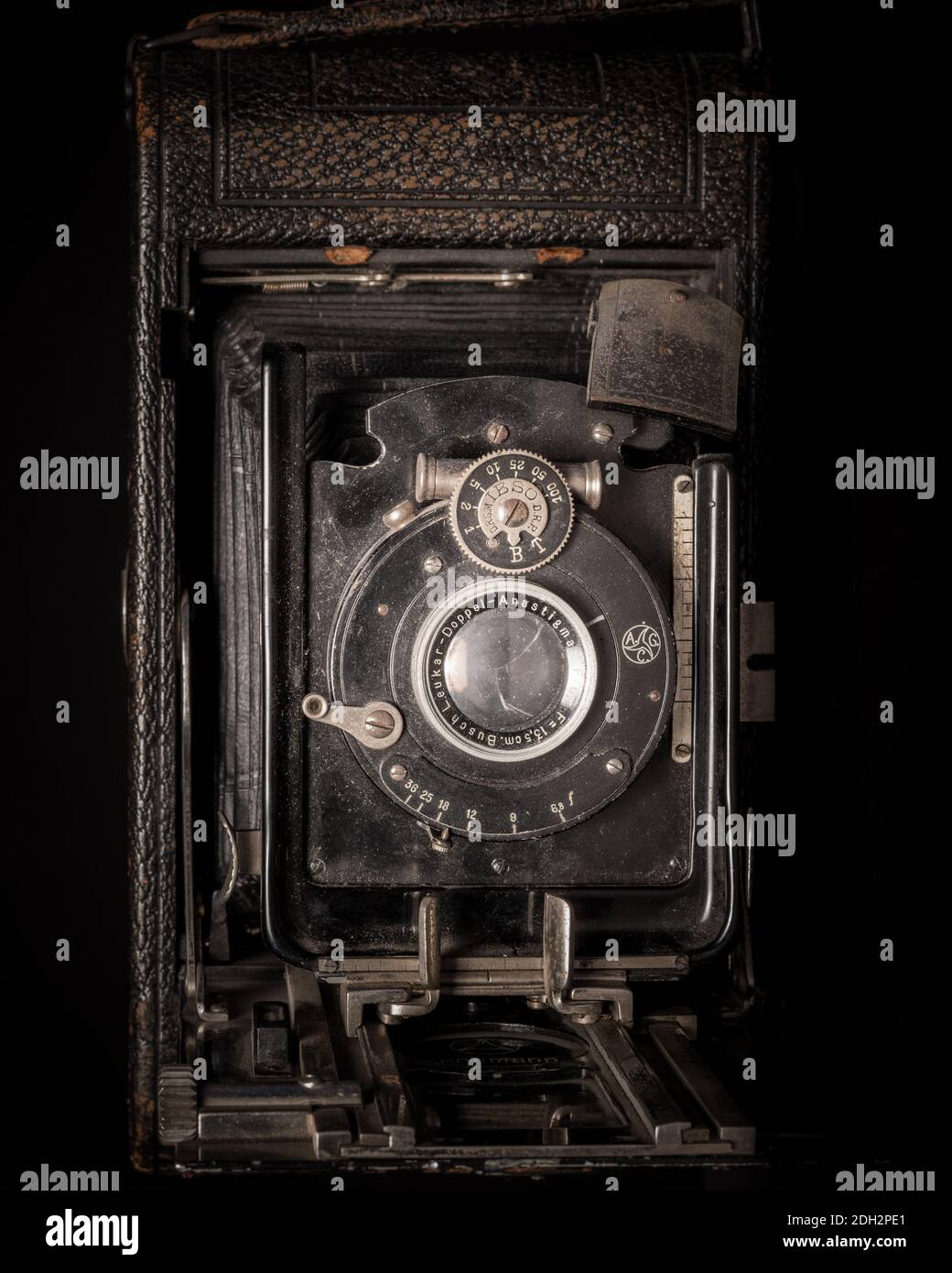 Vintage camera with rollfilm close up, camera body and lens, photo