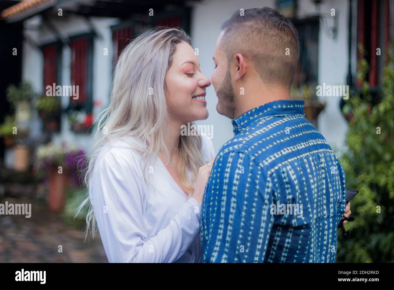 A Caucasian loving couple romantically looking at each other Stock Photo
