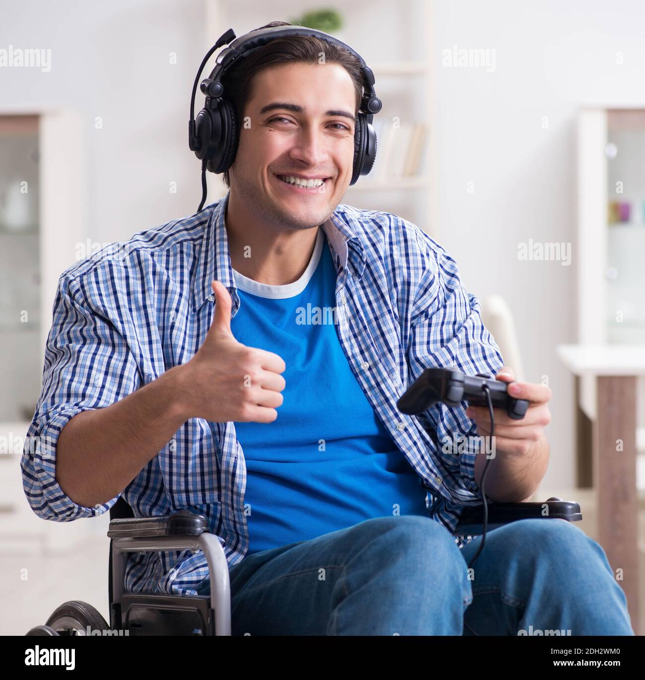 Disabled man playing computer games during rehabilitation Stock Photo Alamy