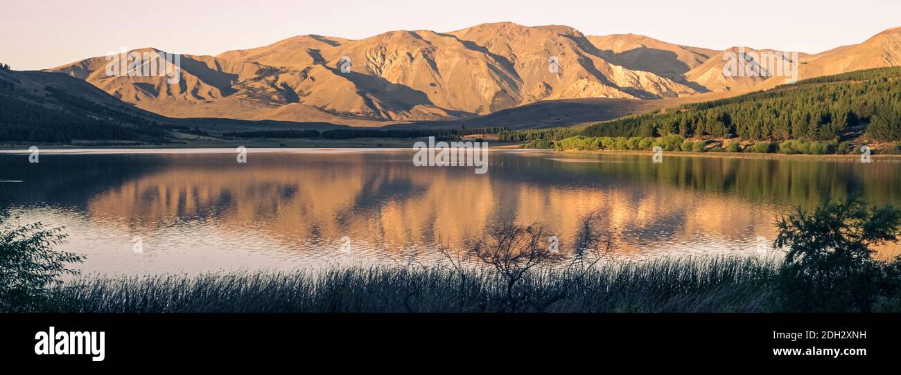 La Zeta lagoon in the city of Esquel during sunrise Patagonia Argentina Stock Photo