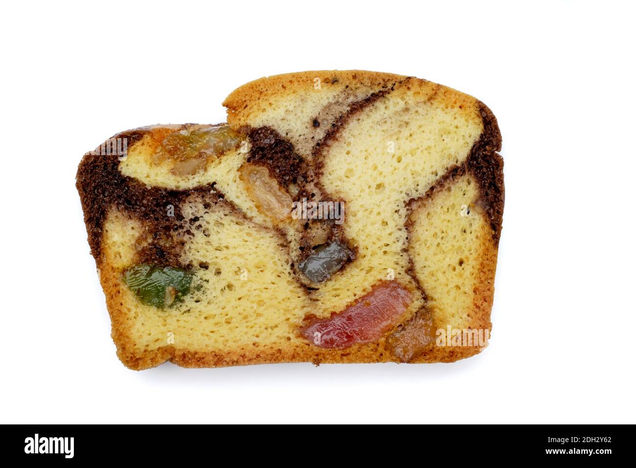 Slice of Romanian sponge cake with cocoa, turkish delight and raisins Stock Photo