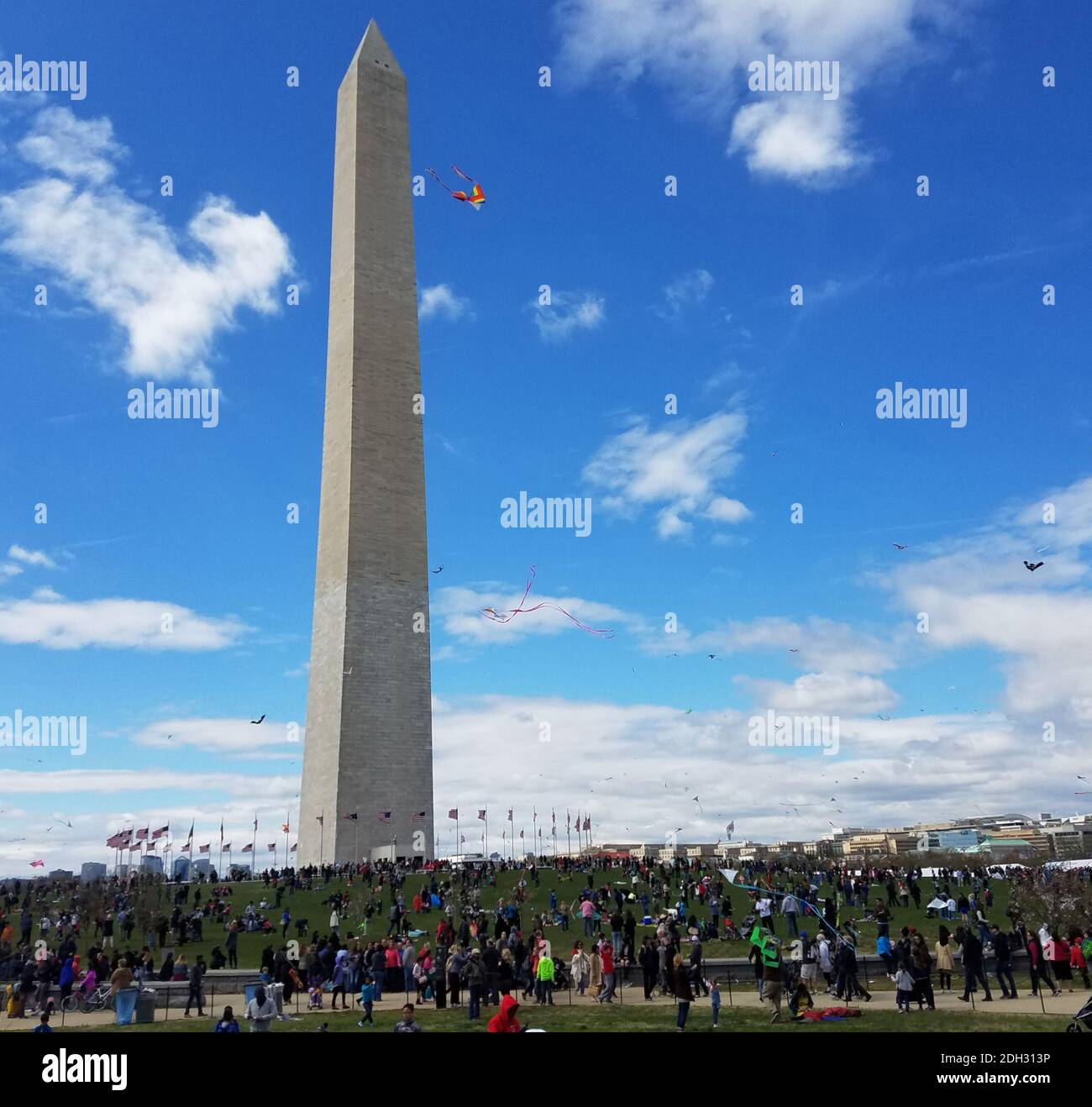 WASHINGTON, DC April 01, 2017 Adults and children flying kites at the Kite Festival on the