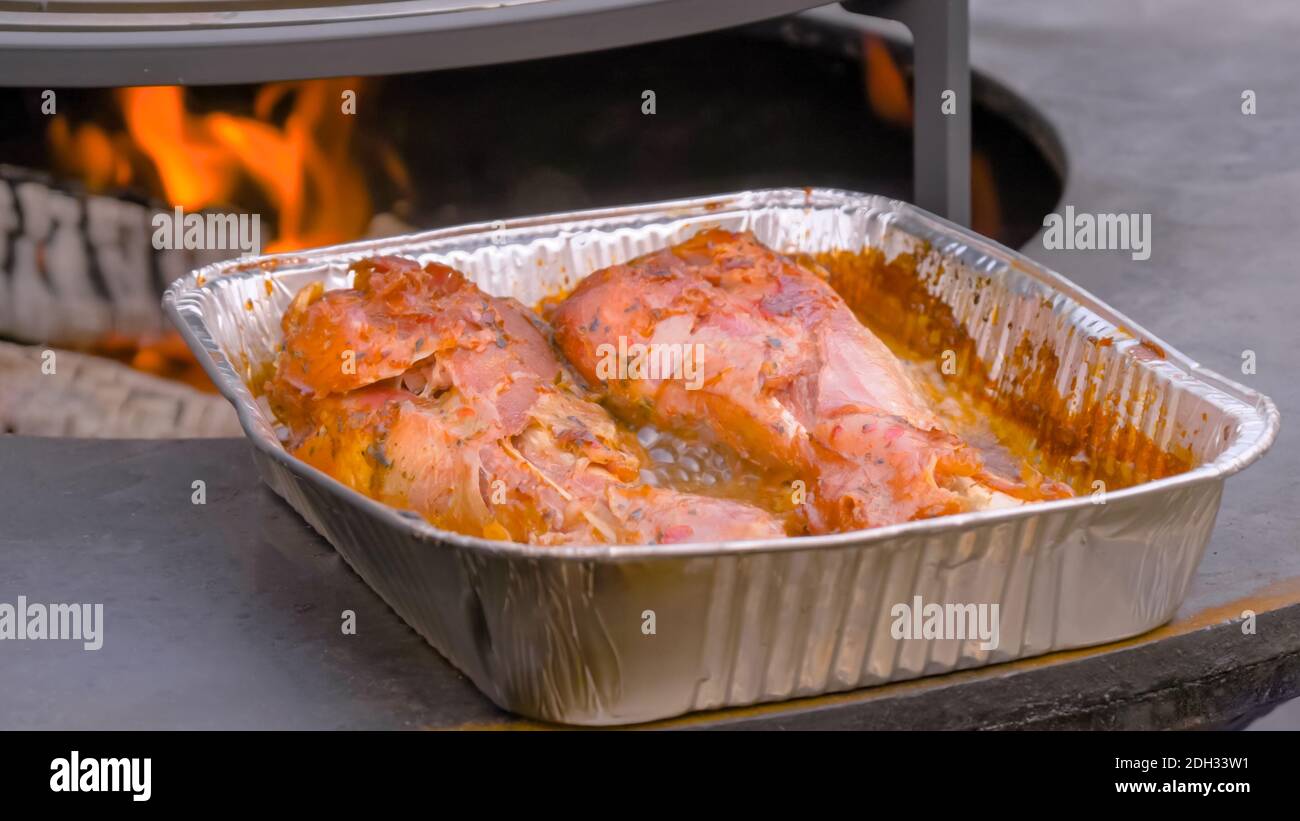 Process of cooking roasted turkey legs in disposable aluminium foil ...