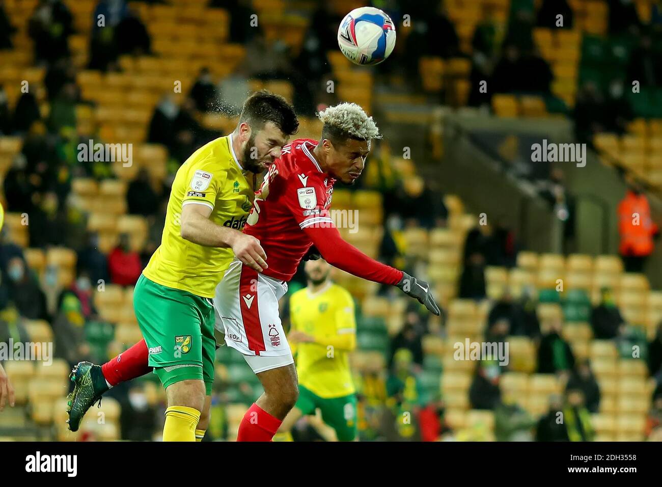 9th December 2020; Carrow Road, Norwich, Norfolk, England, English Football League Championship Football, Norwich versus Nottingham Forest; Grant Hanley of Norwich City tussles for a header with Lyle Taylor of Nottingham Forest Credit: Action Plus Sports Images/Alamy Live News Stock Photo