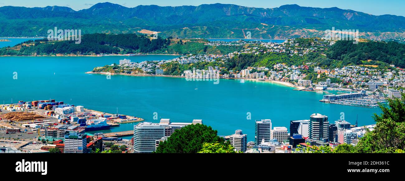 WELLINGTON, NEW ZEALAND - Feb 25, 2020: Afternoon view during summer looking across the city and harbour towards the popular inner city beach at Orien Stock Photo