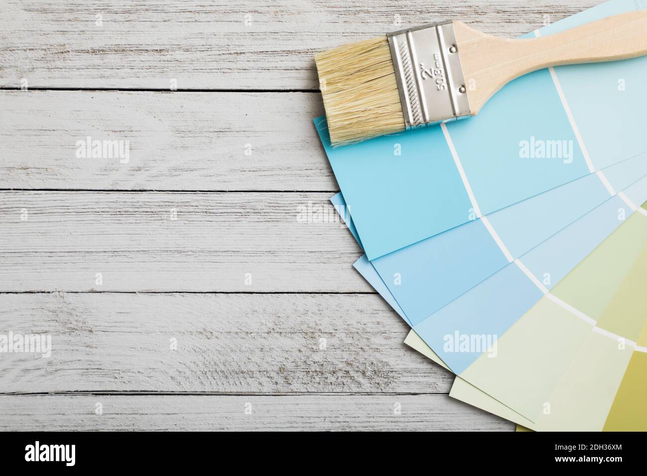 paint samples laying on wood Stock Photo