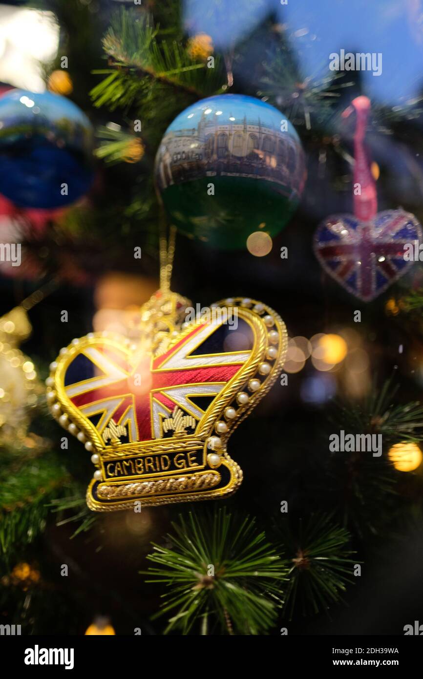 Cambridge UK December 2020 Christmas tree ornaments hanging on a green