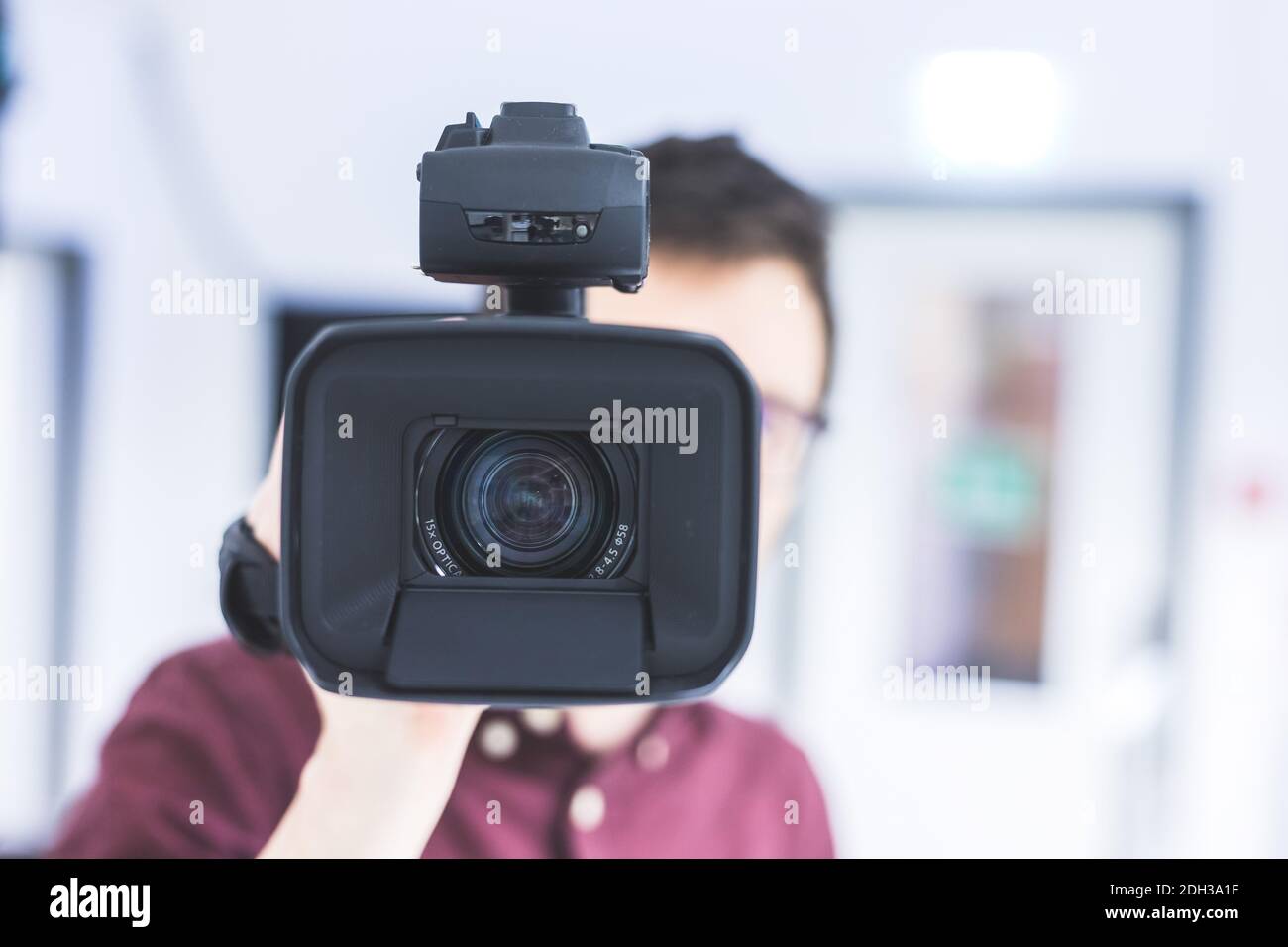 Professional film production: Male filmmaker is recording with a ...