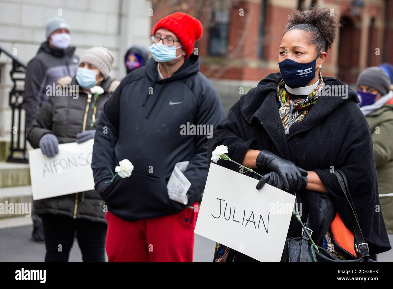 Dec. 9. 2020. Cambridge, MA. Activists, workers and community members rallied at Harvard University and marched around Harvard Square to protest Harva Stock Photo