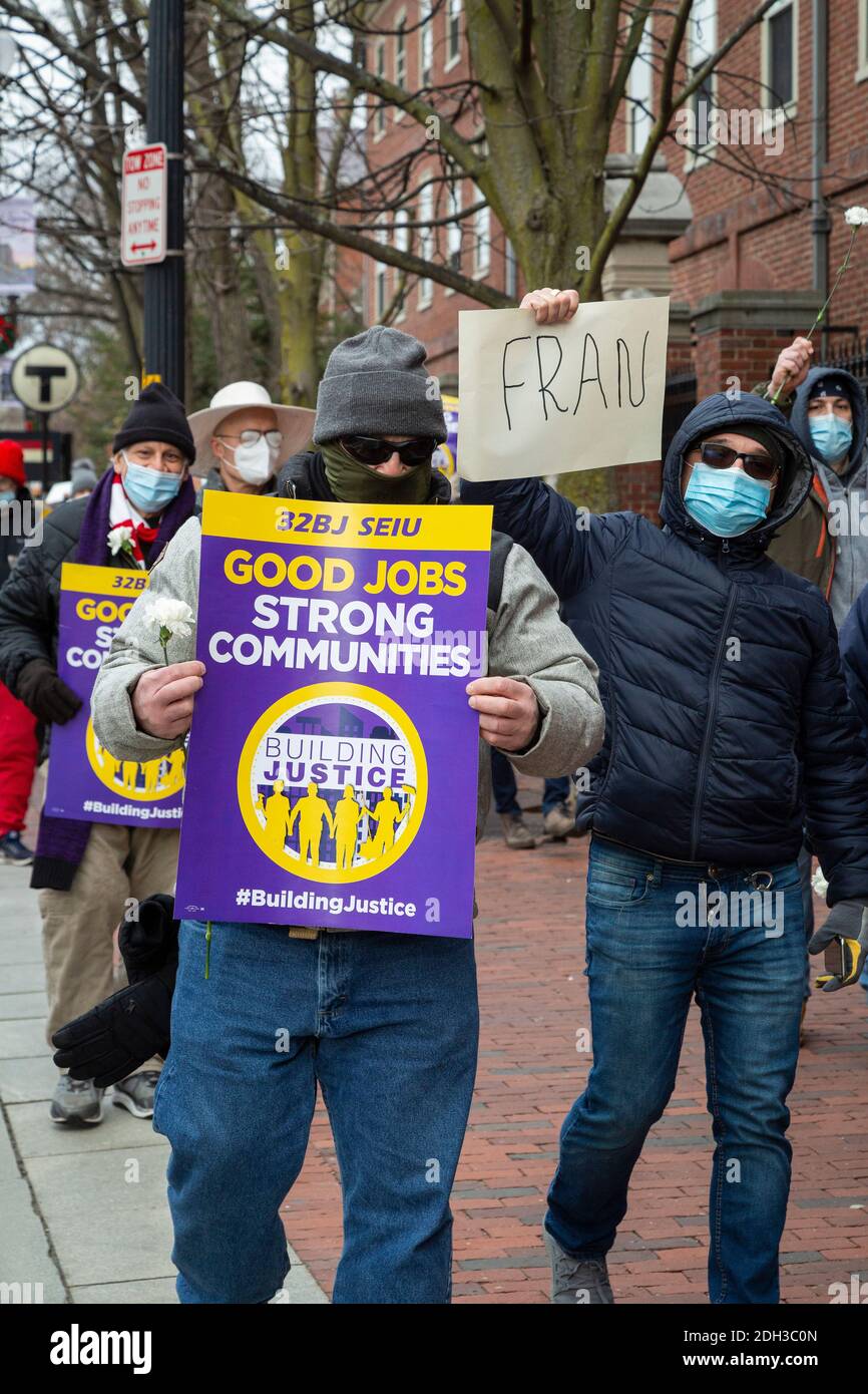 Dec. 9. 2020. Cambridge, MA. Activists, workers and community members rallied at Harvard University and marched around Harvard Square to protest Harva Stock Photo