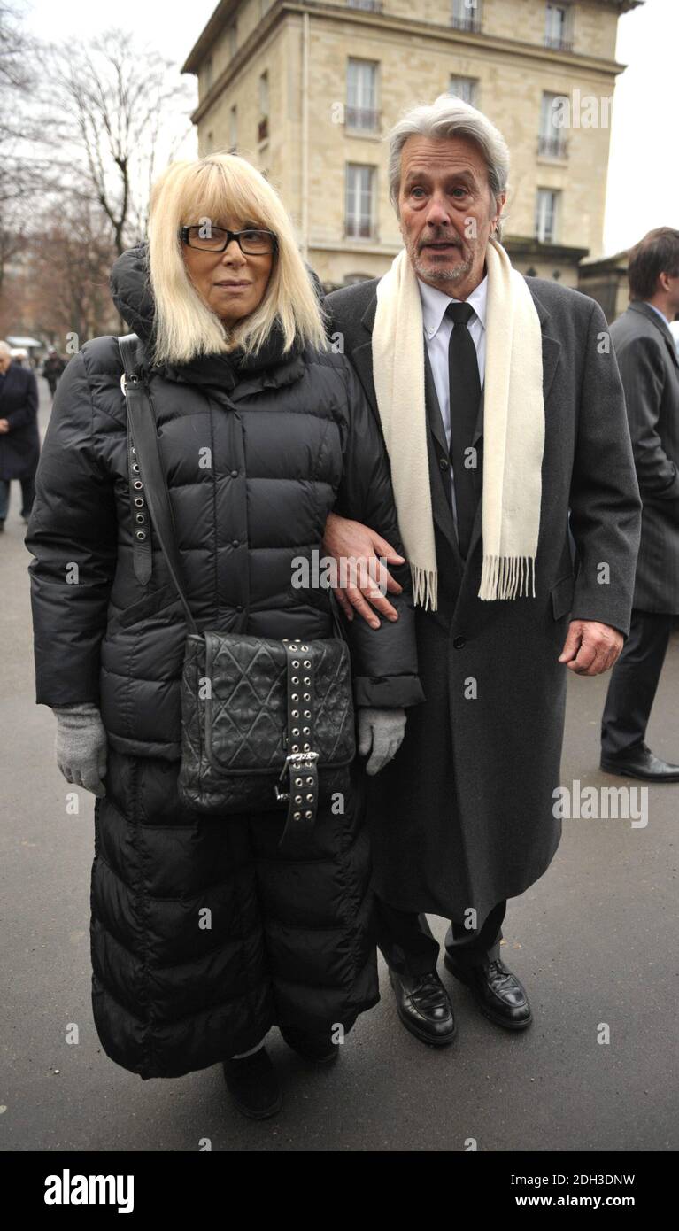 File photo - Alain Delon and Mireille Darc attending the funeral of Georges Cravenne who died aged 94, at the Montparnasse cemetery, in Paris, France, on January 14, 2009. Darc died at 79 it was announced today. She was Alain Delon's longtime co-star and companion. She appeared as a lead character in Jean-Luc Godard's 1967 film Week End. Photo by ABACAPRESS.COM Stock Photo
