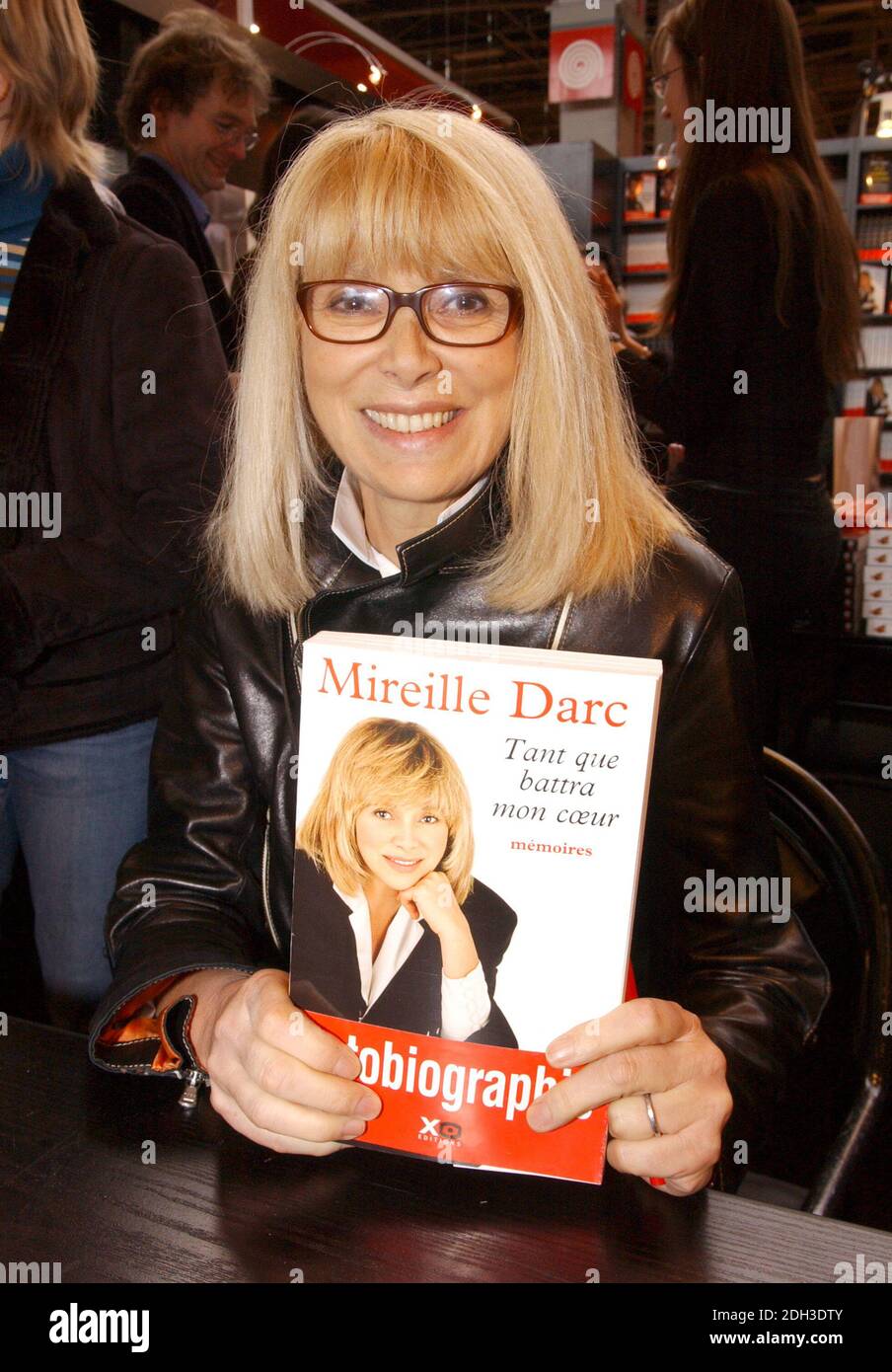 File photo - French actress Mireille Darc promotes her book 'Tant que Battra mon Coeur' during the Paris Book Fair 'Le Salon Du Livre' held at Porte de Versailles, in Paris, France, on March 19, 2006. Darc died at 79 it was announced today. She was Alain Delon's longtime co-star and companion. She appeared as a lead character in Jean-Luc Godard's 1967 film Week End. Photo by Bruno Klein/ABACAPRESS.COM Stock Photo