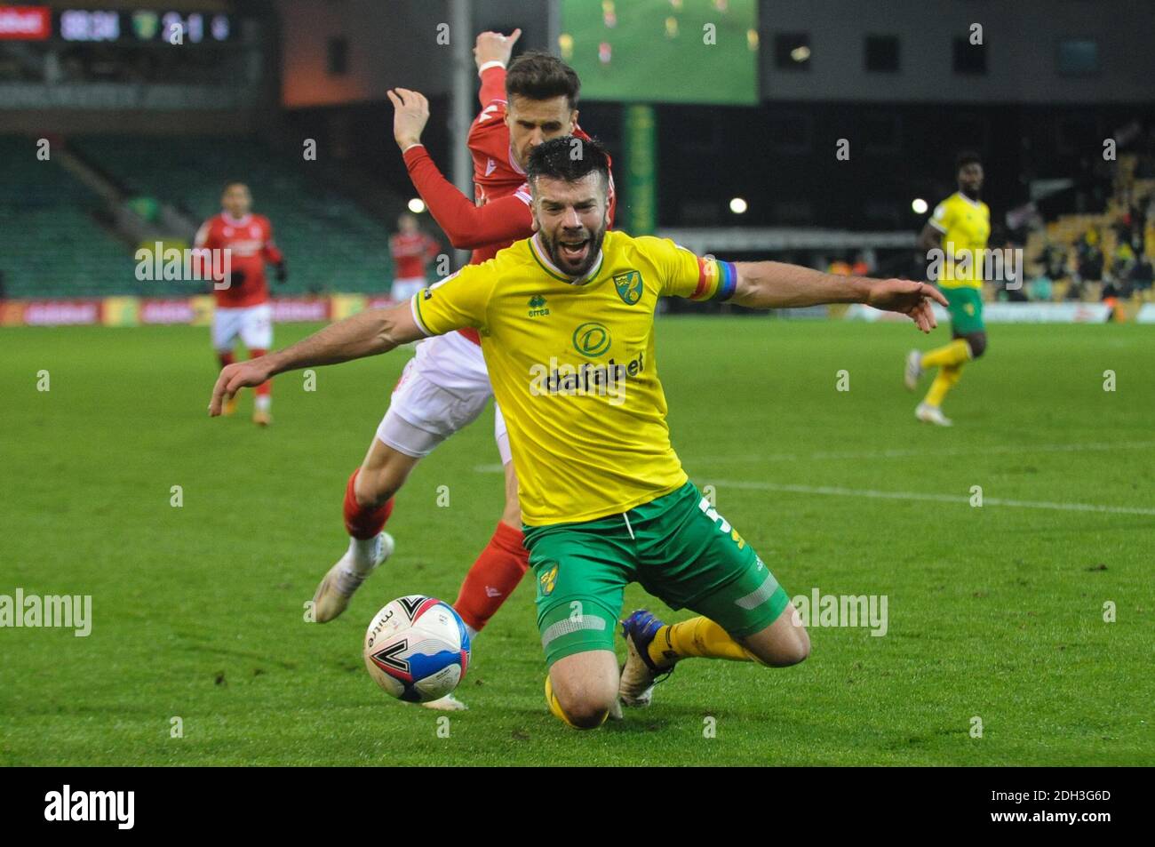 Norwich, UK. 9th Dec 2020. Norwichs Grant Hanley gets in front of Nottinghams Carl Jenkinson during the Sky Bet Championship match between Norwich City and Nottingham Forest at Carrow Road, Norwich on Wednesday 9th December 2020. (Credit: Ben Pooley | MI News) Credit: MI News & Sport /Alamy Live News Stock Photo