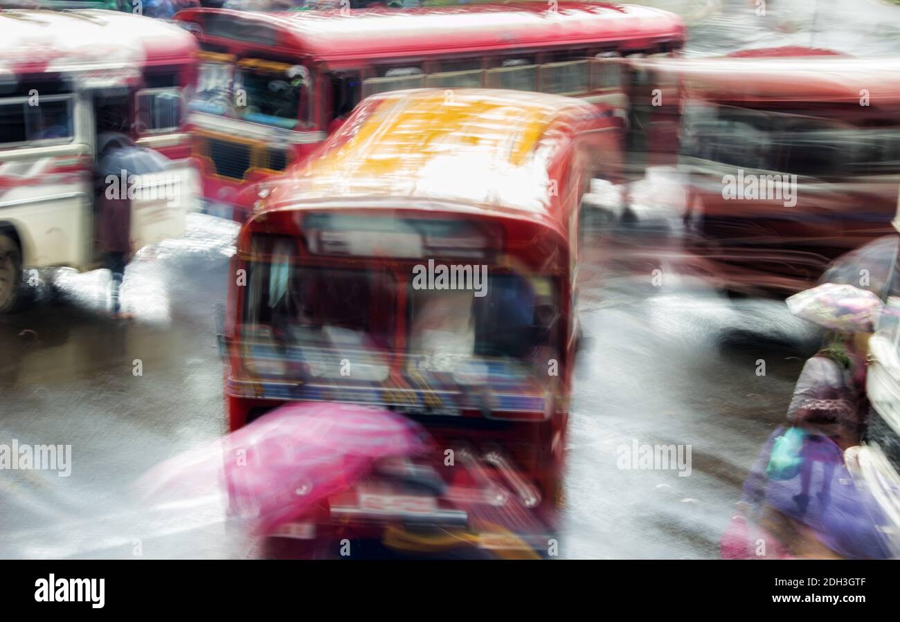 Blur night bus in rainy weather in Southeast Asia. Stock Photo