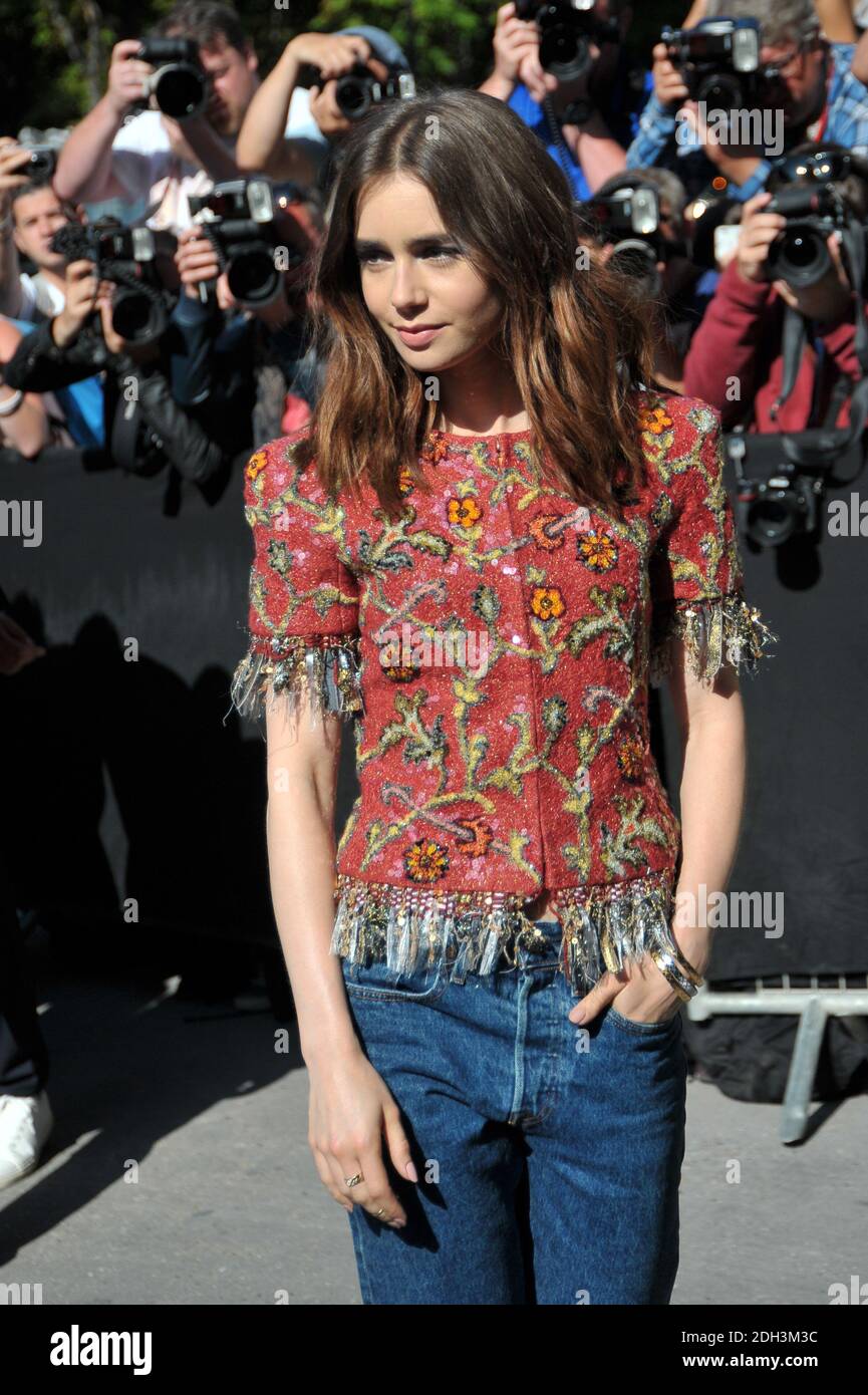 Lily Collins arriving to the Chanel Haute-Couture Fall-Winter 2014-2015  fashion show held at the Grand Palais, in Paris, France, on July 8, 2014.  Photo by Robin Psaila/ABACAPRESS.COM Stock Photo - Alamy