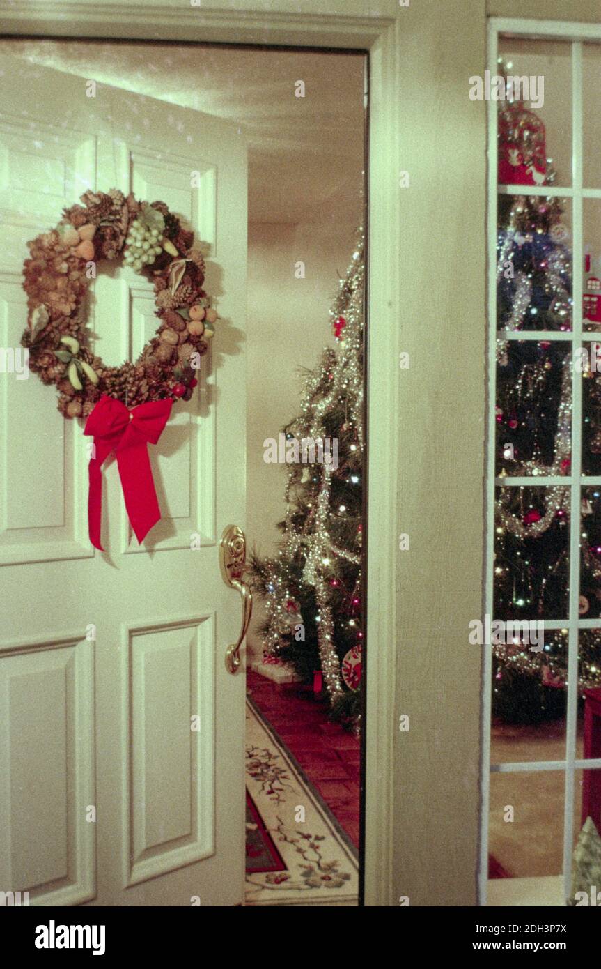 Holiday Scene of wreath on front door and Christmas tree, CA,  USA Stock Photo
