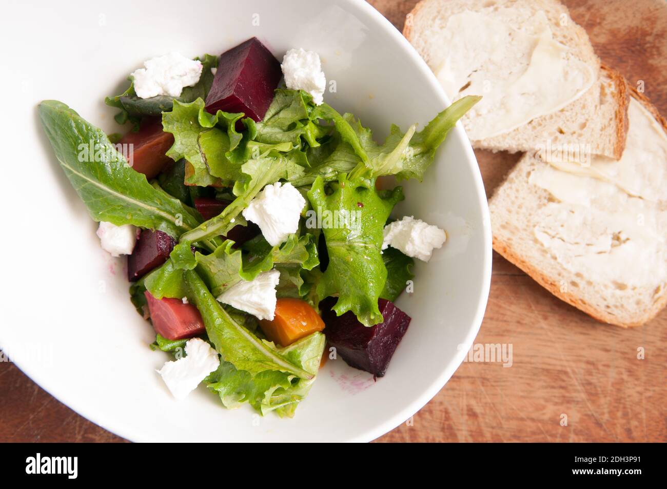 beet and goat cheese salad with home made bread Stock Photo