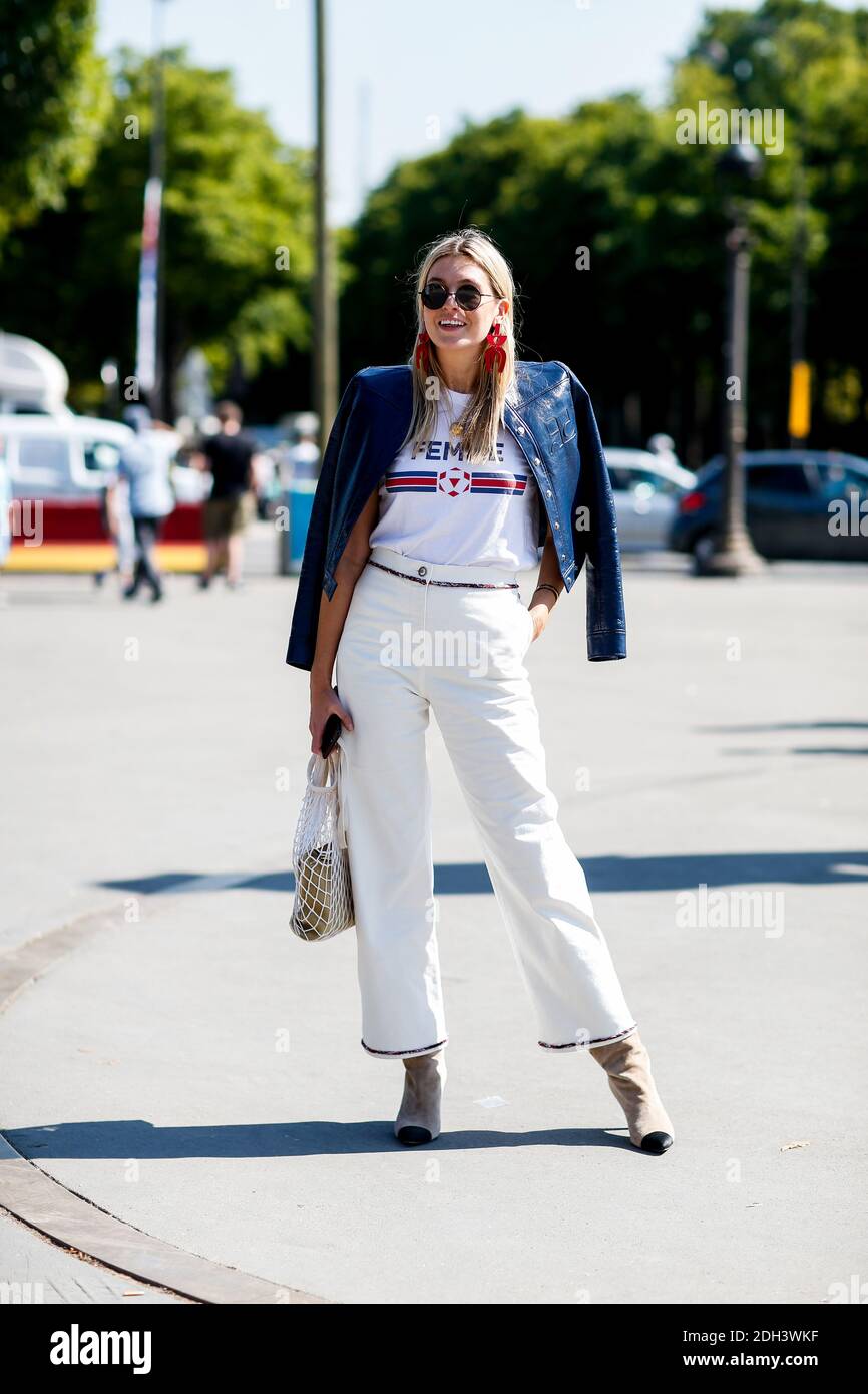 Camille Charriere in a chic Chanel jumpsuit