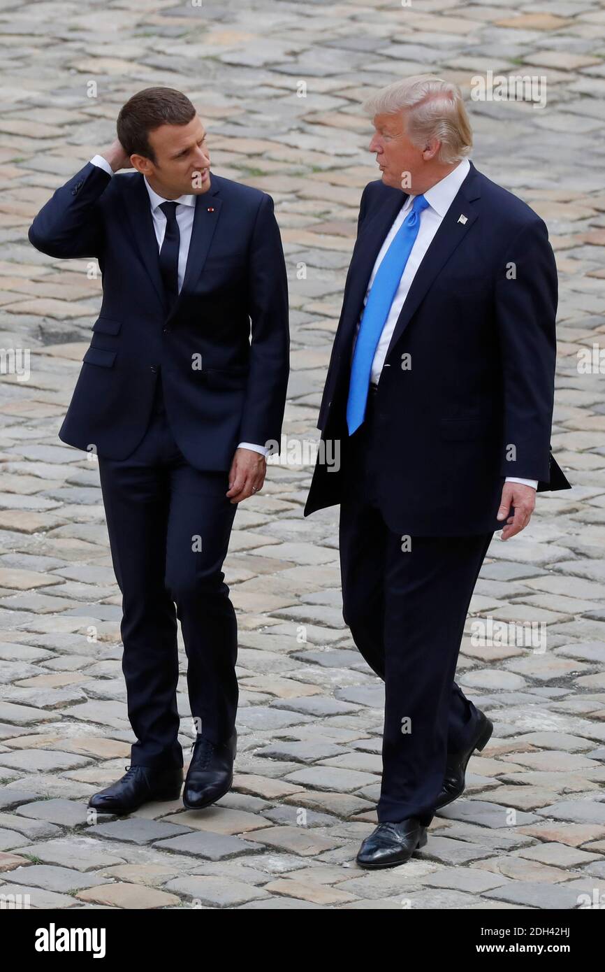 French President Emmanuel Macron greets US's President Donald Trump at his arrival in Hotel des Invalides in Paris, France on July 13th, 2017. Photo by Henri Szwarc/ABACAPRESS.COM Stock Photo