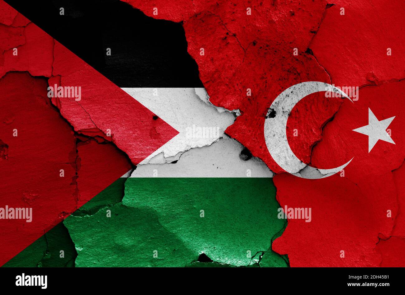 Flags of Palestine and Turkey painted on cracked wall Stock Photo