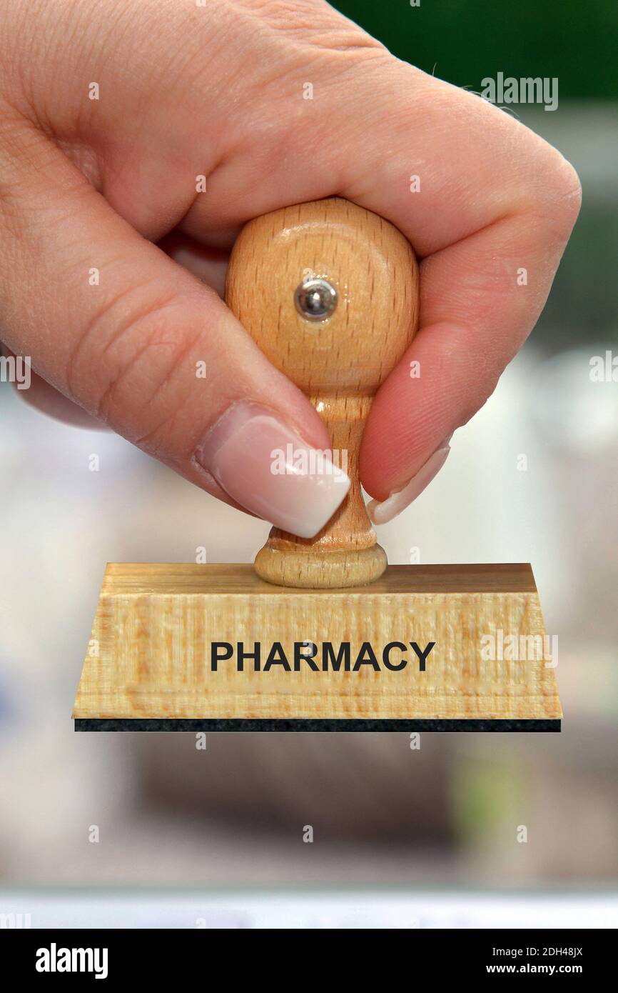 Hand mit Stempel, Frauenhand, Aufschrift: Pharmacy, Apotheke, Online-Apotheke Stock Photo