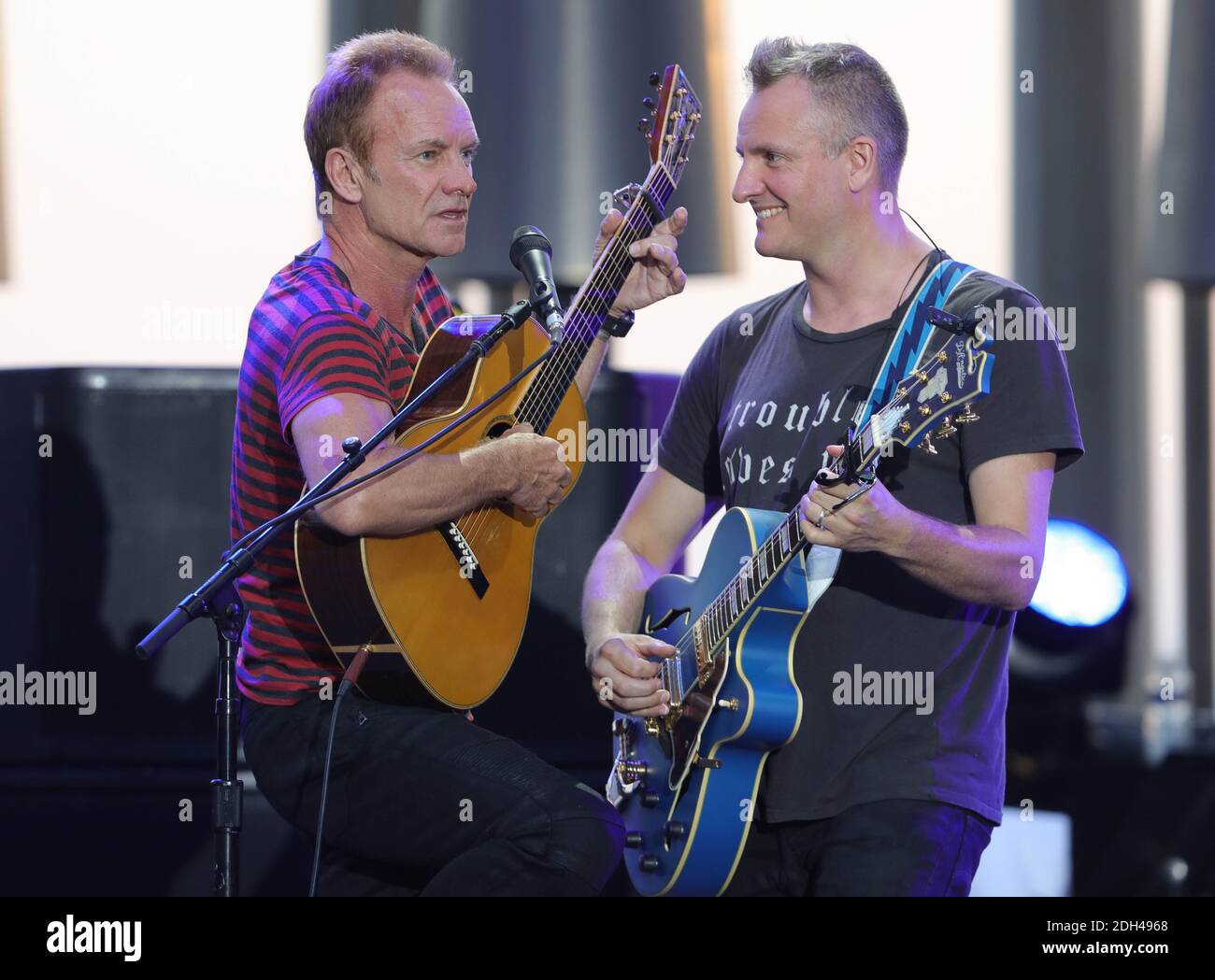 Sting and his son songwriter and musician Joe Sumner perform during ...