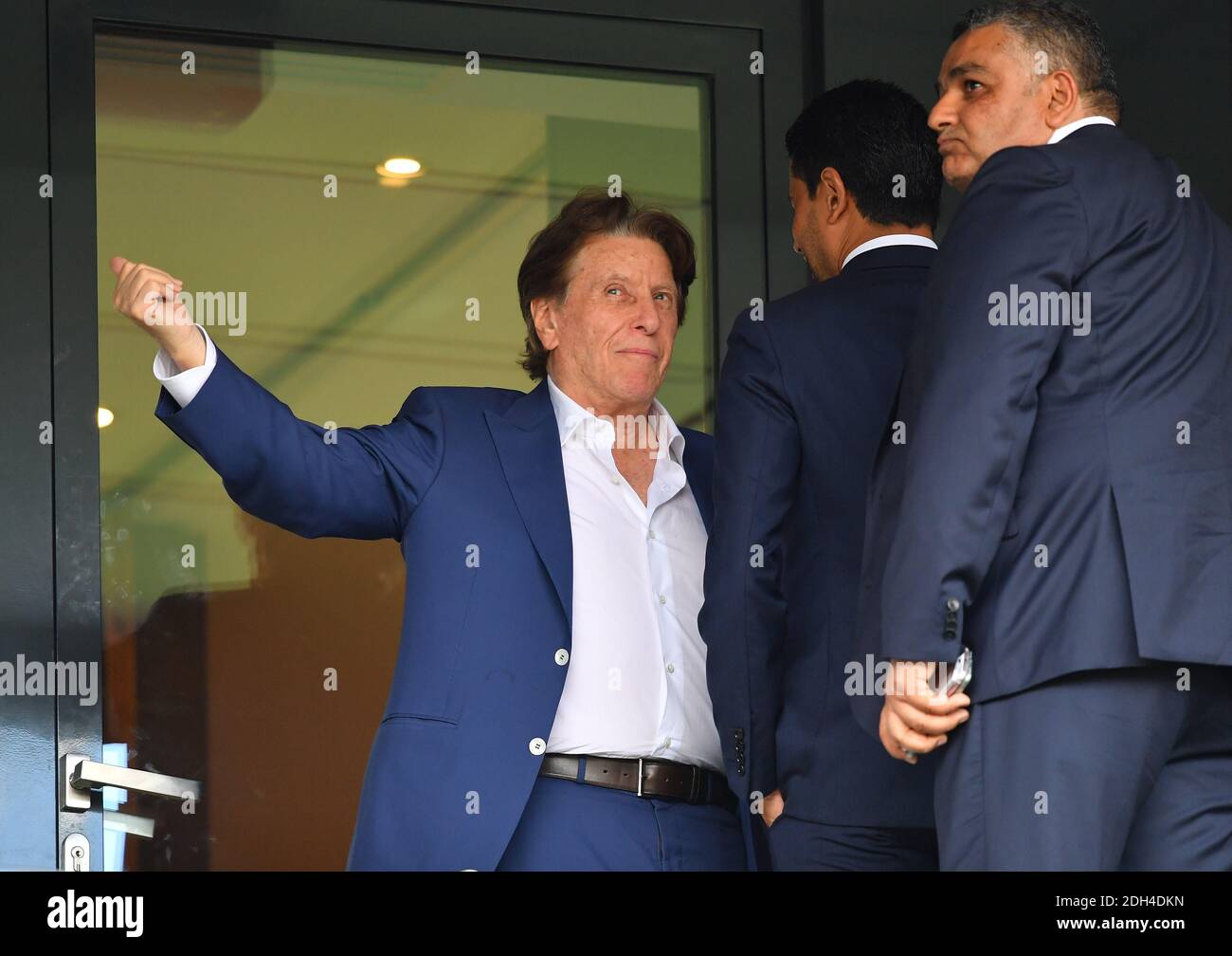 Israeli football agent Pini Zahavi chats with PSG's Qatari president Nasser  Al-Khelaifi as they watch from the stands Ligue 1 football match PSG vs  Amiens SC held at Parc des Princes stadium
