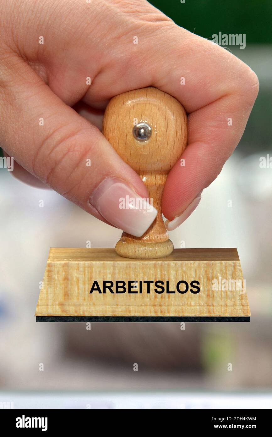 Hand mit Stempel, Frauenhand, Aufschrift: Arbeitslos, Job, Job Center, Arbeit, Stock Photo