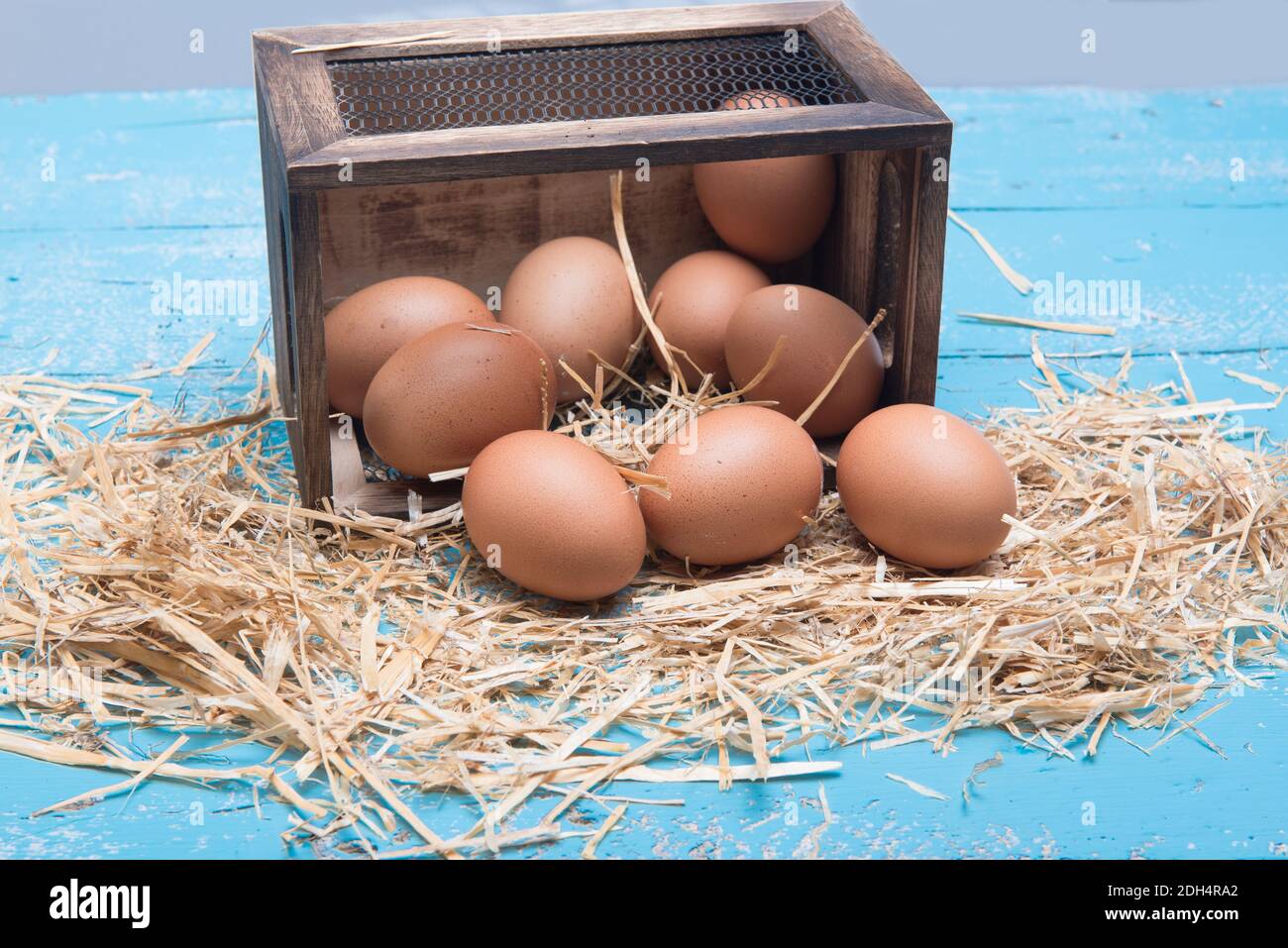 Chicken Eggs In A Box With Straw On The Table Stock Photo Alamy