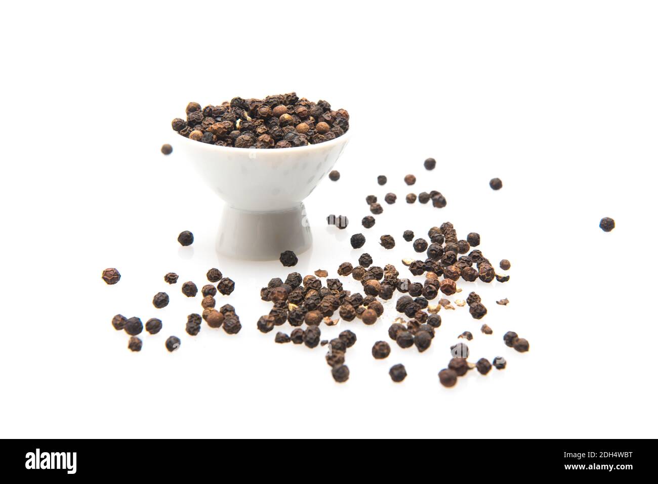 peppercorns to spice up food on white background Stock Photo Alamy